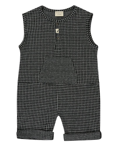 Unisex organic cotton black and white checkered playsuit with a grey pocket in the front and short sleeves. Designer TurtleDove London.