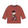 Long-sleeved cotton jersey T-shirt is printed with a "preppy" motif representing a little boy on his way back to school. By Jean Bourget.