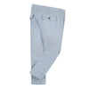 blue chambray pants have a graphic drawstring with orange ends. Fluid and light, silhouette is trimmed with two welt pockets at the front and back. Deigned by Jean Bourget.