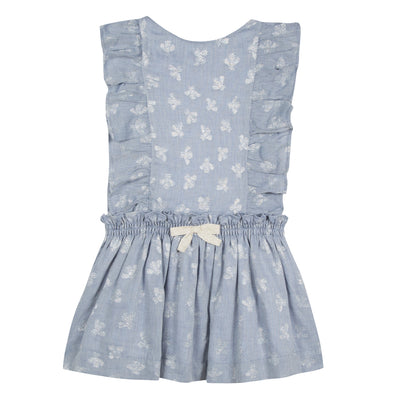 Jean Bourget light blue chambray dress is adorned with silver lurex bees in all over. The silhouette is animated with bands fluttering on the sides at the front and in the back. The skirt is pleated and the waist is bent by an elastic decorated with a golden bow.