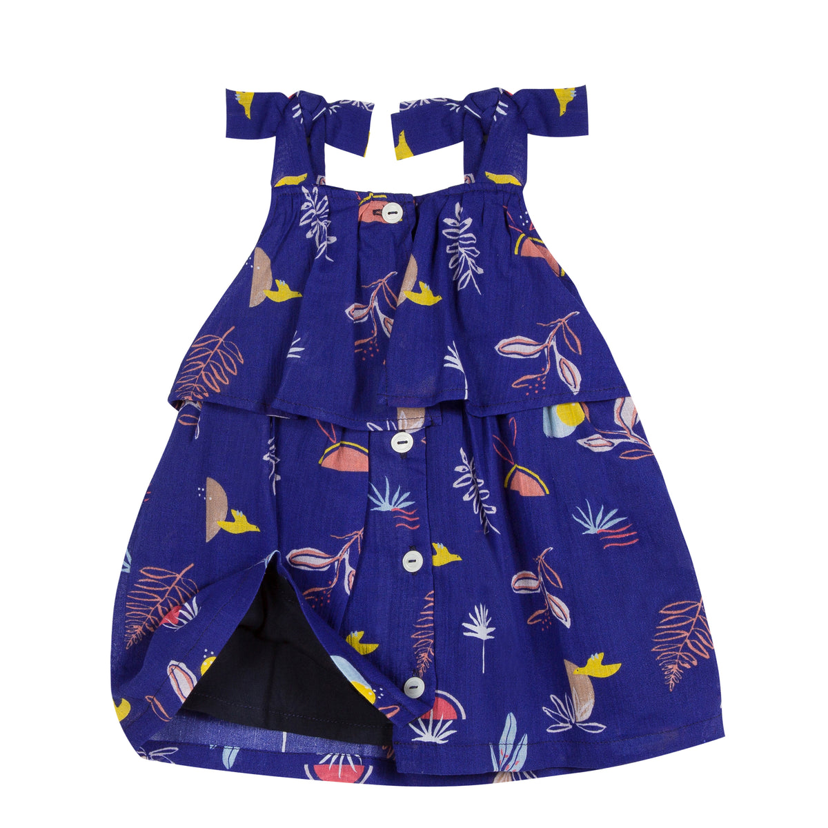 Ultramarine cotton-crepe dress is printed with a cheerful, exotic pattern of birds and tropical plants all over. Designed by Jean Bourget.