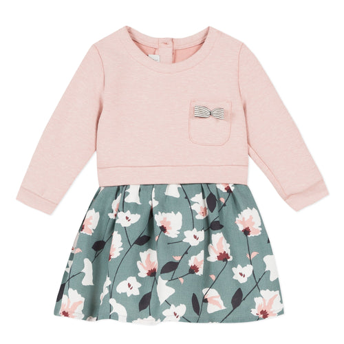 Jean Bourget baby girls dress featuring a rose colored top, floral bottom and a front accent pocket.