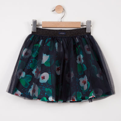 knee-length skirt in tulle on percale printed with flowers for a chic girls' look. Double plain tulle on printed percale. Sequinned elastic waistband. Catimini Label.