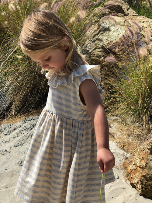 Light grey Vignette dress with wide stripes with ruffles along with back.