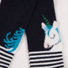 Warm and ultra-soft knitted tights for girls. Midnight blue stretch knit with unicorn pattern. By Catimini.