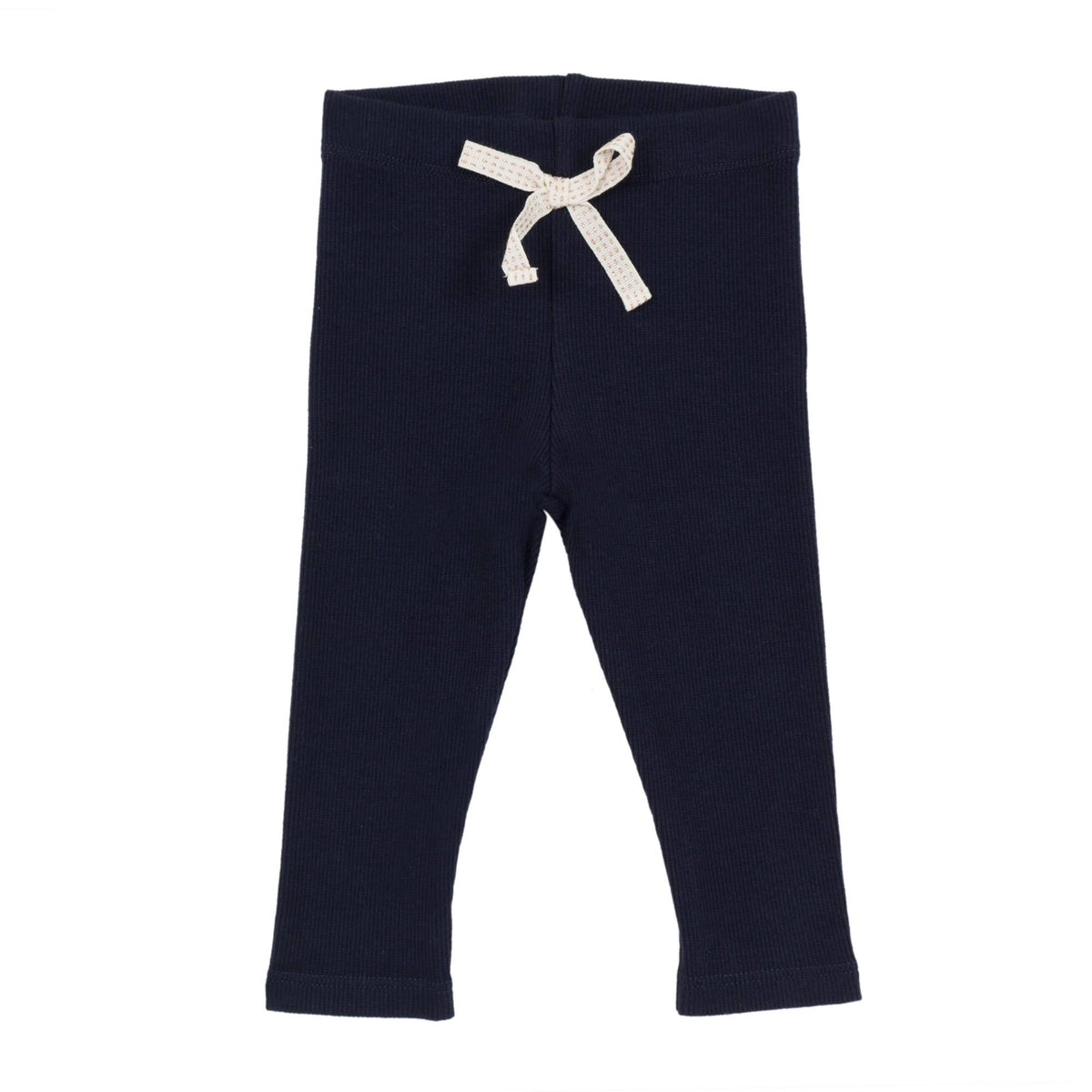 Jean Bourgert navy blue cotton leggings is punctuated by fine ribs and large ivory ribbon at the waist.