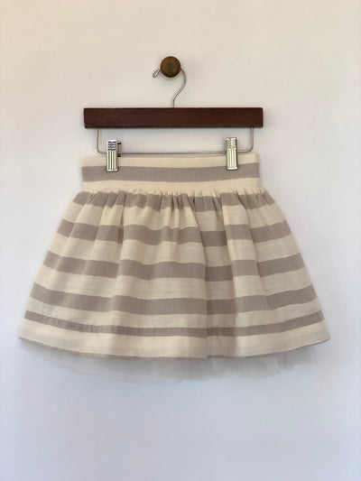 Girls grey and off-white skirt with wide stripes and tulle lining. Shop Vignette for girls.