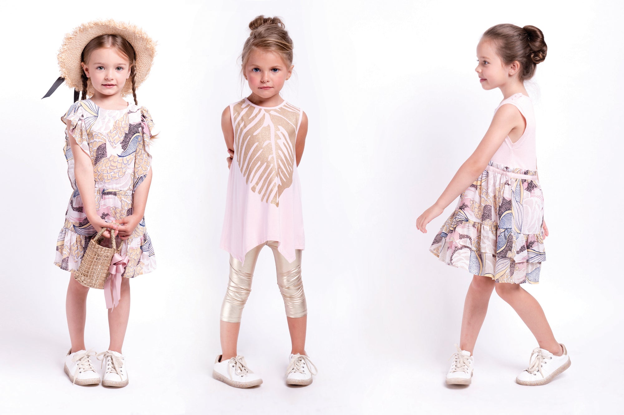 Pink sleeveless dress with feather and paisley for little girls. Dress is designed by Image.